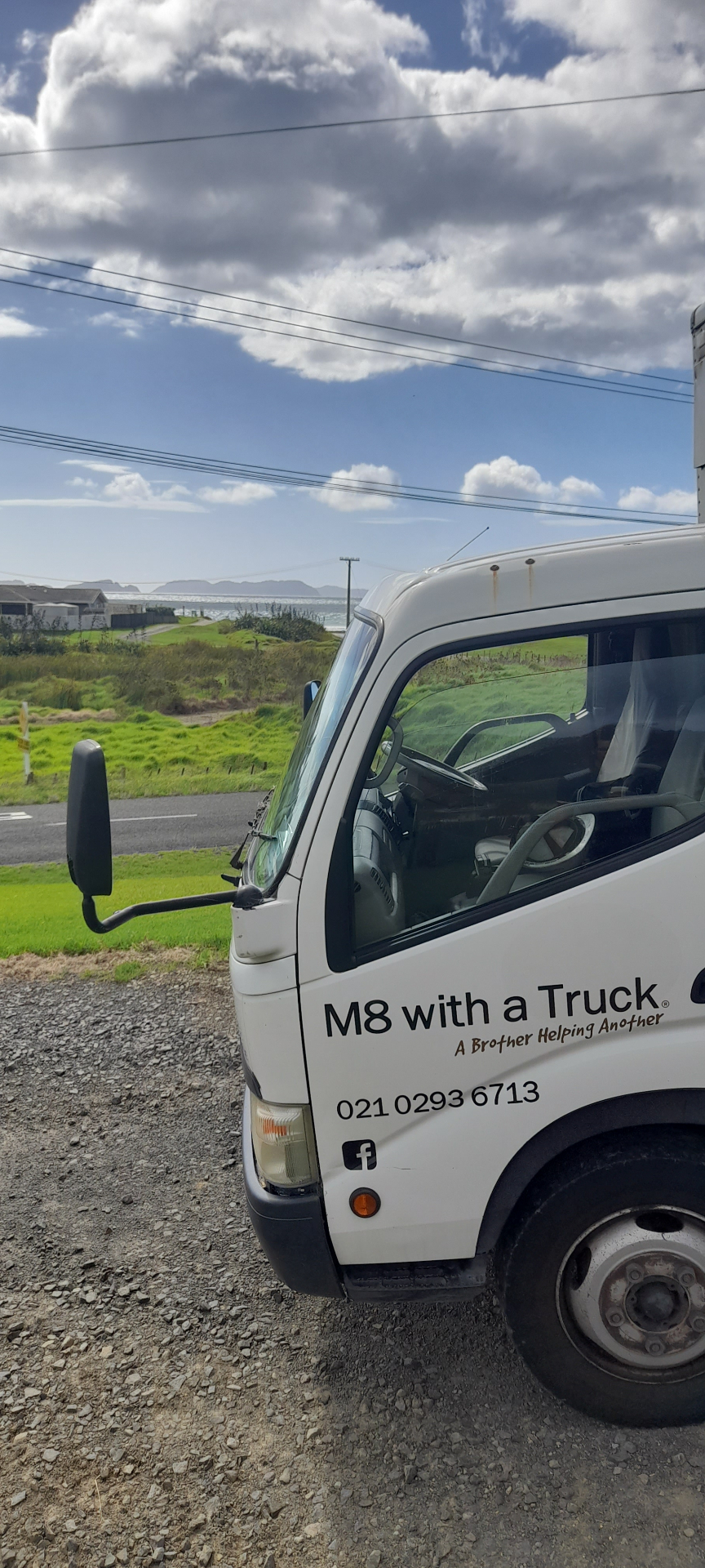 M8 With A Truck by the Bay of Plenty coast
