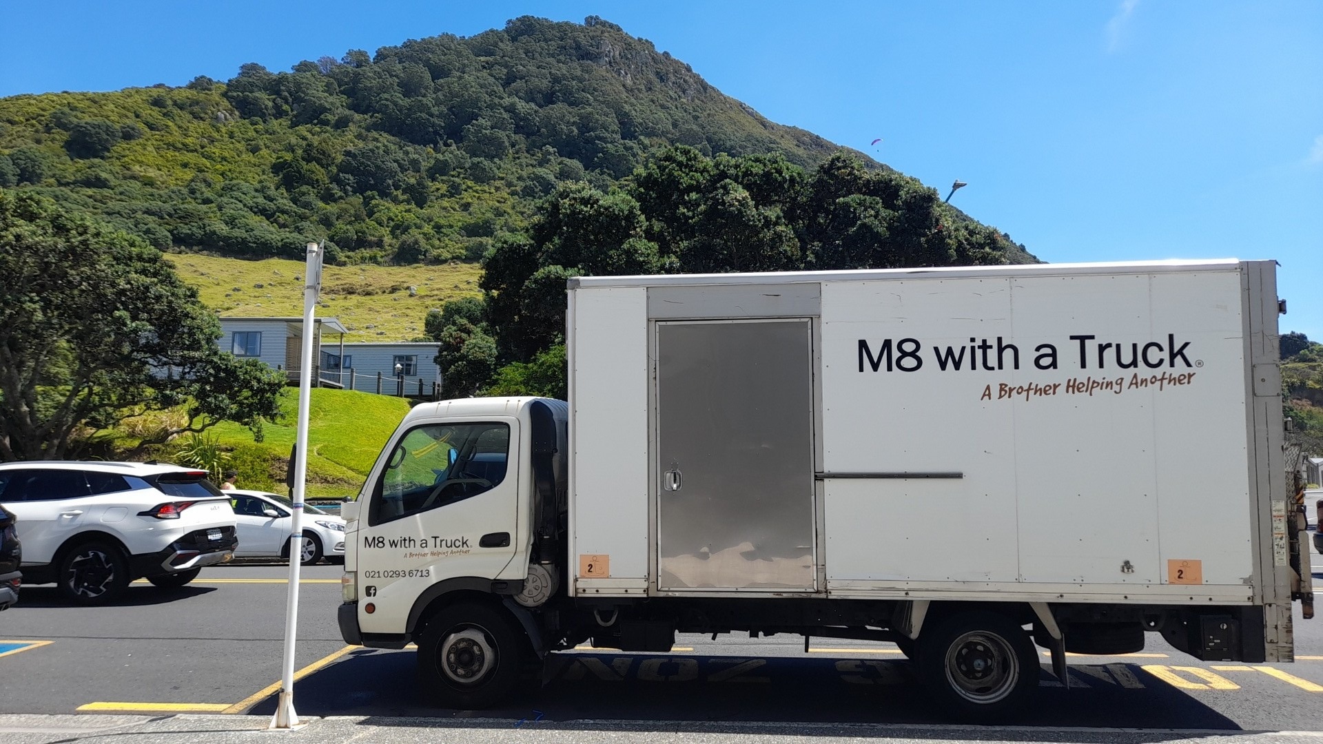 M8 With A Truck parked by the bush